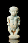 EGYPTIAN FAIENCE AMULET OF PATAIKOS

 Ca. 664-332 BC
 A finely modelled Egyptian faience amulet of the dwarf god Pataikos, nude, crouching with his...