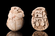 EGYPTIAN STEATITE SCARAB WITH HATHOR

 Ca. 1550-664 BC
 A fine Egyptian steatite scarab with naturalistic features such as a clypeus and prothorax ...