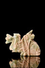 EGYPTIAN FAIENCE WEDJAT AMULET WITH LION

 Ca. 664-332 BC
 A light green glazed faience amulet representing a wedjat-eye, or Eye of Horus depicting...
