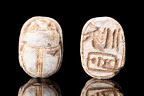 EGYPTIAN STEATITE SCARAB WITH THUTMOSE

 Ca. 1504-1450 BC
 A fine Egyptian steatite scarab with naturalistic features such as a clypeus and prothor...