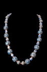 ANCIENT MOSAIC GLASS EYE BEAD NECKLACE

 Phoenician, ca. 600 BC and later (up to post medieval)
 A captivating restrung necklace, adorned with intr...