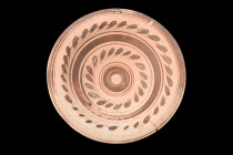 MESSAPIAN DECORATED POTTERY DISH

 Ca. 300 BC
 A pottery plate featuring a round body with a convex cavity, perfectly suited for serving and presen...