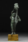 ROMAN BRONZE WINGED CUPID FIGURINE - WITH REPORT

 Ca. 100-200 AD
 The figure is of a young boy, standing naked on the tips of his toes, as if he w...