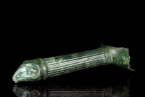 ROMAN BRONZE PATERA HANDLE WITH RAM HEAD

 Ca. 100-300 AD
 A finely modelled, hollow cast bronze example of a patera handle terminating in the head...