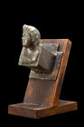 ROMAN BRONZE PROTOME BUST OF APOLLO

 Ca. 100-200 AD
 A bronze bust of the God Apollo, exquisitely crafted and expertly rendered. This captivating ...