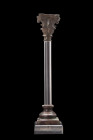 ROMAN BRONZE ARCHITECTURAL MODEL OF A CORINTHIAN COLUMN

 Ca. 100-300 AD
 An exceptional bronze architectural model of a Corinthian column, a maste...