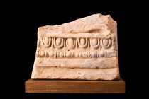 ROMAN MARBLE RELIEF WITH DECORATION 

 Ca. 100-300 AD
 A marble relief fragment adorned with a mesmerizing ovolo decoration register, it exudes an ...