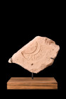 ROMAN TERRACOTTA BRICK WITH STAMP ON STAND 

 Ca. 100-300 AD
 A terracotta brick fragment featuring a unique stamp imprint of a crescent shape encl...