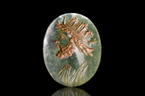 ROMAN JASPER RING STONE WITH IMPERIAL PORTRAIT 

 Ca. 200 AD
 A jasper ring stone with intricate left-facing portrait of an imperial male figure. T...