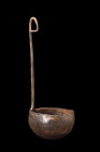 ROMAN BRONZE LADLE

 Ca. 1-200 AD
 A bronze ladle with a deep, rounded bowl, attached to a long, flat-section handle, forms a perfect harmony of fo...