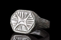 MEDIEVAL BRONZE RING WITH STAR OF BETHLEHEM

 Crusaders Era, ca. 1100-1400 AD
 A bronze finger ring comprising a round hoop and hexagonal-shaped be...