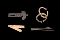 MEDIEVAL GROUP OF FOUR MEASURING INSTRUMENTS

 Ca. 1500-1600 AD
 A group of measuring instruments, including a compass/divider and an assortment of...