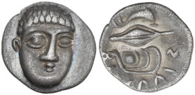 Greek Italy. Central and Southern Campania, Phistelia. AR Obol, c. 325-275 BC. Obv. Male head facing slightly right. Rev. Dolphin, barley grain and mu...