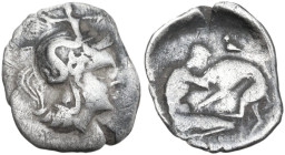 Greek Italy. Southern Apulia, Tarentum. AR Diobol, 325-280 BC. Obv. Head of Athena right, wearing helmet decorated with Scylla. Rev. Herakles kneeling...