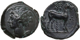 Punic Sicily. AE 17 mm, late 4th-early 3rd century BC. Obv. Head of Tanit left, wearing wreath of grain. Rev. Horse standing right before palm tree; t...