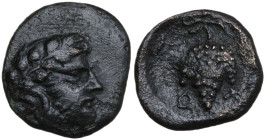 Continental Greece. Macedon, Thessalonika. Skotussa mint. AE Chalkous. Early 4th century BC. Obv. Head of bearded Dionysos to right, wearing ivy wreat...