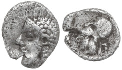 Greek Asia. Mysia, Lampsakos. AR Tetartemorion, 500-450 BC. Obv. Female head left. Rev. Head of Athena left, wearing Corinthian helmet. AR. 0.13 g. 6....