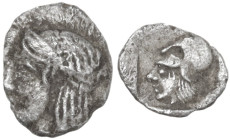 Greek Asia. Mysia, Lampsakos. AR Tetartemorion, 500-450 BC. Obv. Female head left. Rev. Head of Athena left, wearing Corinthian helmet. AR. 0.17 g. 6....