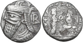 Greek Asia. Kings of Parthia. Vologases IV (147-191). AR Tetradrachm. Obv. Diademed bust left, wearing tiara; to right, B. Rev. King seated left, rece...