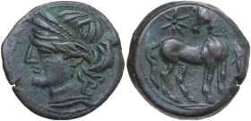 Africa. Zeugitania, Carthage. AE Shekel. Second Punic War. Circa 215-201 BC. Obv. Head of Tanit left, wearing wreath of grain. Rev. Horse standing rig...