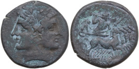 Anonymous. AR Debased quadrigatus (Didrachm), uncertain Campanian or Apulian mints, 216-215 BC. Obv. Laureate Janiform head of Dioscuri. Rev. Jupiter ...