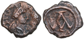 Justinian I (527-565). AE Nummus, Carthage mint. Obv. Diademed and draped bust right. Rev. Large A (mark of value). MIB 193; Sear 281. AE. 0.39 g. 9.2...
