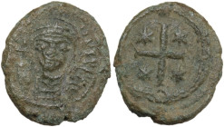 Justinian I (527-565). AE Decanummium. Ravenna mint, c. 552-565 AD. Obv. Helmeted and cuirassed bust facing, holding globus cruciger and shield. Rev. ...