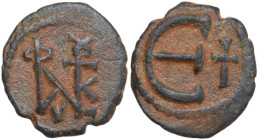 Justin II (565-578). AE Pentanummium. Theoupolis (Antioch) mint. Obv. Monogram. Rev. Large Є; cross to right. D.O. 185; MIB 65b; Sear 385. AE. 1.65 g....