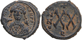 Tiberius II Constantine (578-582). AE Half Follis, Theupolis (Antioch) mint, dated RY 1 (578-579). Obv. Crowned bust facing, wearing consular robes, h...