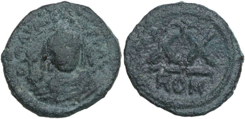 Maurice Tiberius (582-602). AE Half follis, Rome mint. Obv. Bust facing, crowned...