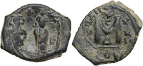 Heraclius, with Heraclius Constantine (610-641). AE Follis, Constantinople mint, 4th officina. Obv. Heraclius, on left, in military attire, holding lo...