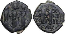 Heraclius, with Heraclius Constantine and Martina (610-641). AE Follis. Cyprus mint, 3rd officina. Dated RY 18 (626/7). Obv. Heraclius standing facing...