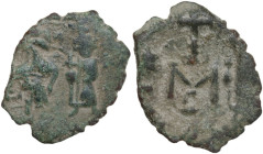 Constans II (641-668). AE Follis. Constantinople mint. Obv. Constans, with long beard, wearing crown and military dress, holding long cross, and Const...