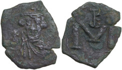 Constans II (641-668). AE Follis, Syracuse mint, 674-648. Obv. Crowned and draped bust facing, holding globus cruciger. Rev. Large M; above, monogram....