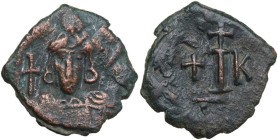 Constantine IV Pogonatus (668-685). AE Decanummium, Constantinople mint, 668-674. Obv. Helmeted and cuirassed bust facing, holding globus cruciger. Re...