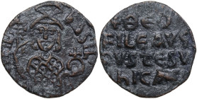 Theophilus (829-842). AE Follis, Constantinople mint, 931-944. Obv. Crowned half-length figure facing, wearing loros, holding labarum and globus cruci...