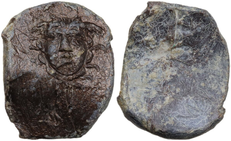 The Roman Empire. PB Lead seal. D/ Medusa facing. R/ Blank. PB. 6.63 g. 20.00 mm...
