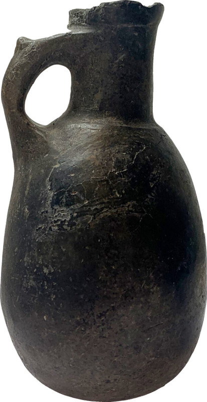 AMLASH POTTERY OLPE Near East, Amlash Culture, c. 800 BC. Brown ceramic olpe wit...