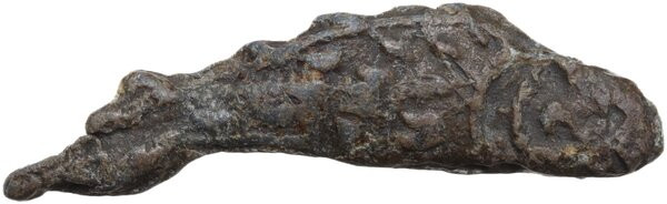 VOTIVE LEAD FISH Greek world, c. 5th-4th century BC. Lead votive fish figurine w...