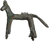 ROMAN HORSE STATUETTE Roman period, c. 3rd-4th century AD. Roman bronze statuette depicting a stylised horse with a long tail. Dimension: 53x39 mm. In...
