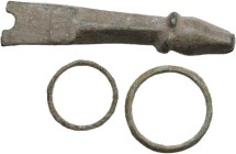 THREE ITEMS From Roman period to Medieval period. Lot of three (3) bronze items; two small rings and a part of a bigger object. Rings size: 13.50 and ...
