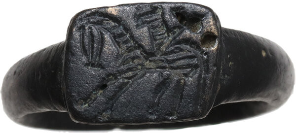 BRONZE 'HORSEMAN' RING Early Medieval period. Bronze ring with representation of...