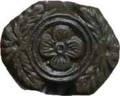 BRONZE STAMP Renaissance. Bronze stamp with central flower with phytomorphic motifs on the sides. Long round-shape bronze stem. Stamp: 11.25x9 mm.; St...