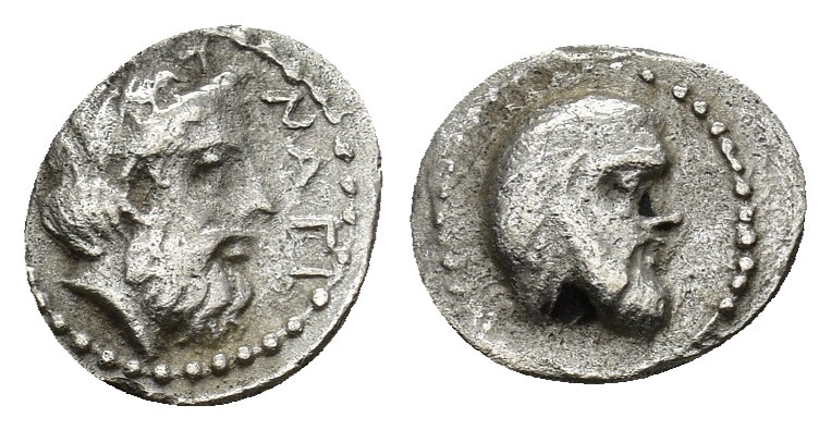 Cilicia. Nagidos circa 400-380 BC. Obol AR (9mm, 0.66 g) Bearded head of Dionyso...
