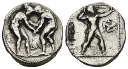 Pamphylia. Aspendos circa 380-330 BC. Stater AR (21mm, 10.56 g) Two wrestlers grappling, ΔΑ between / EΣTFEΔIIY[Σ], slinger in throwing stance right, ...