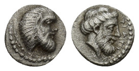 Cilicia. Nagidos circa 400-380 BC. Obol AR (9mm, 0.70 g) Head of Pan right / Bearded head of Dionysos right.