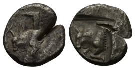Karia, uncertain AR Diobol. (12mm, 2.12 g) Circa 450-400 BC. Confronted foreparts of two bulls / Forepart of bull to left, within incuse square.