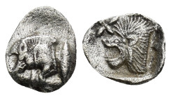 KYZIKOS. Mysia. Ca.527-475 B.C. Hemiobol. (0.38 Gr. 8mm.)
Forepart of boar left, tunny fish to right. 
Rev. Head of roaring lion left, star above.