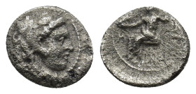 KINGS of MACEDON. Alexander III ‘the Great’. 336-323 BC. AR Obol (0.6 Gr. 9mm.). Babylon Struck under Stamenes or Archon, circa 324/3 BC. 
Head of Her...