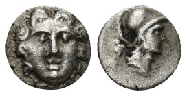 Pisidia, Selge AR Obol. (10mm, 0.86 g) Circa 350-300 BC. Gorgoneion / Helmeted head of Athena right; astragalos behind.